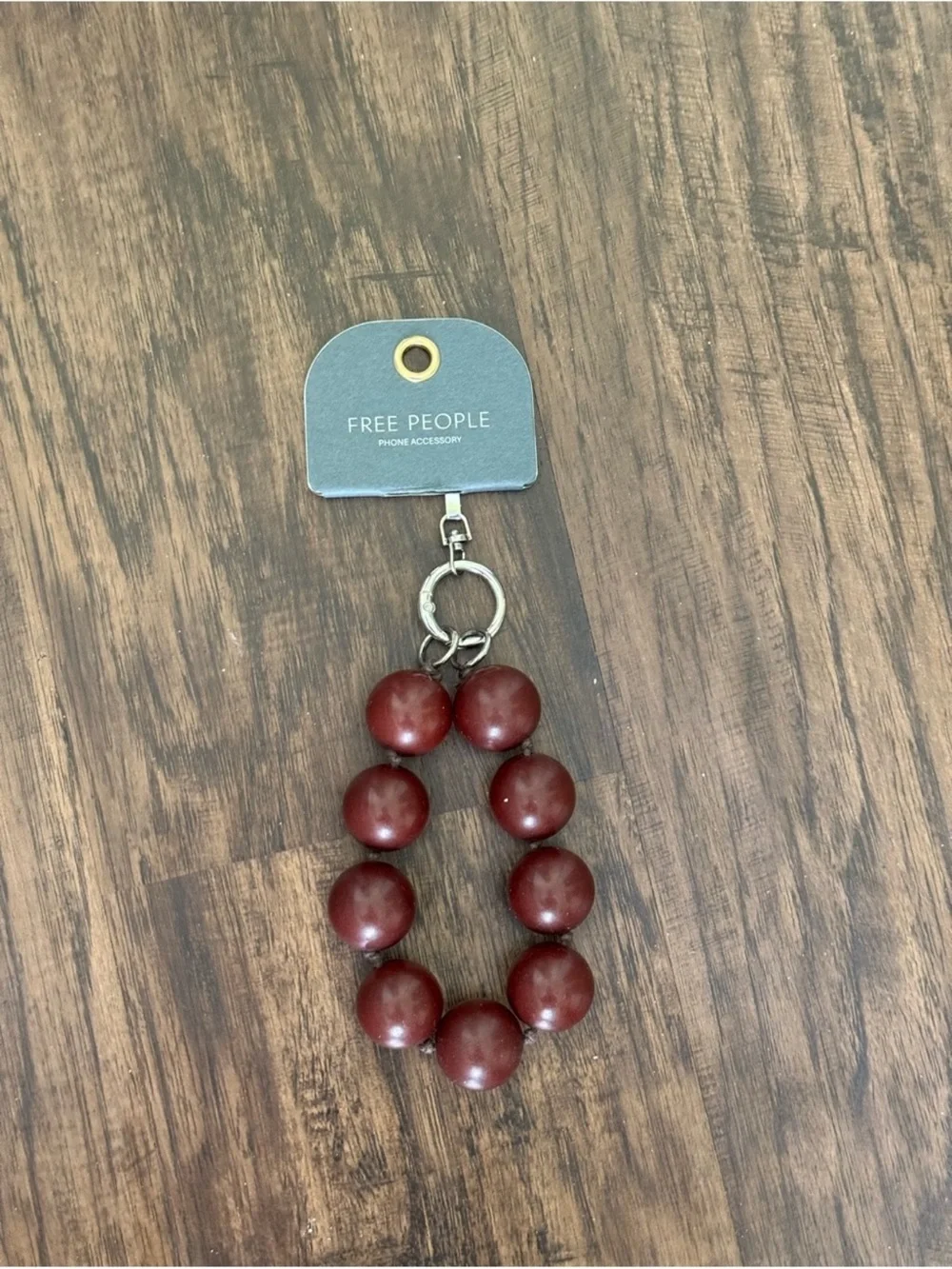 Free People Burgundy Beaded bauble phone wristlet